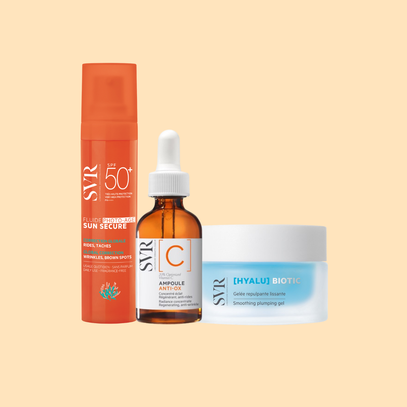 Routine de soins SVR avec fluide solaire orange SPF50+, sérum Ampoule C en flacon ambré et pot de gelée bleue Hyalu Biotic.