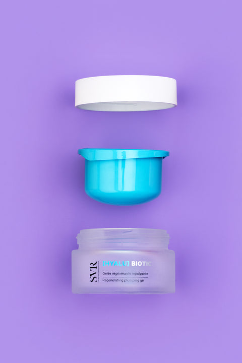 SVR Hyalu Biotic regenerating plumping gel jar with open lid on a purple background.